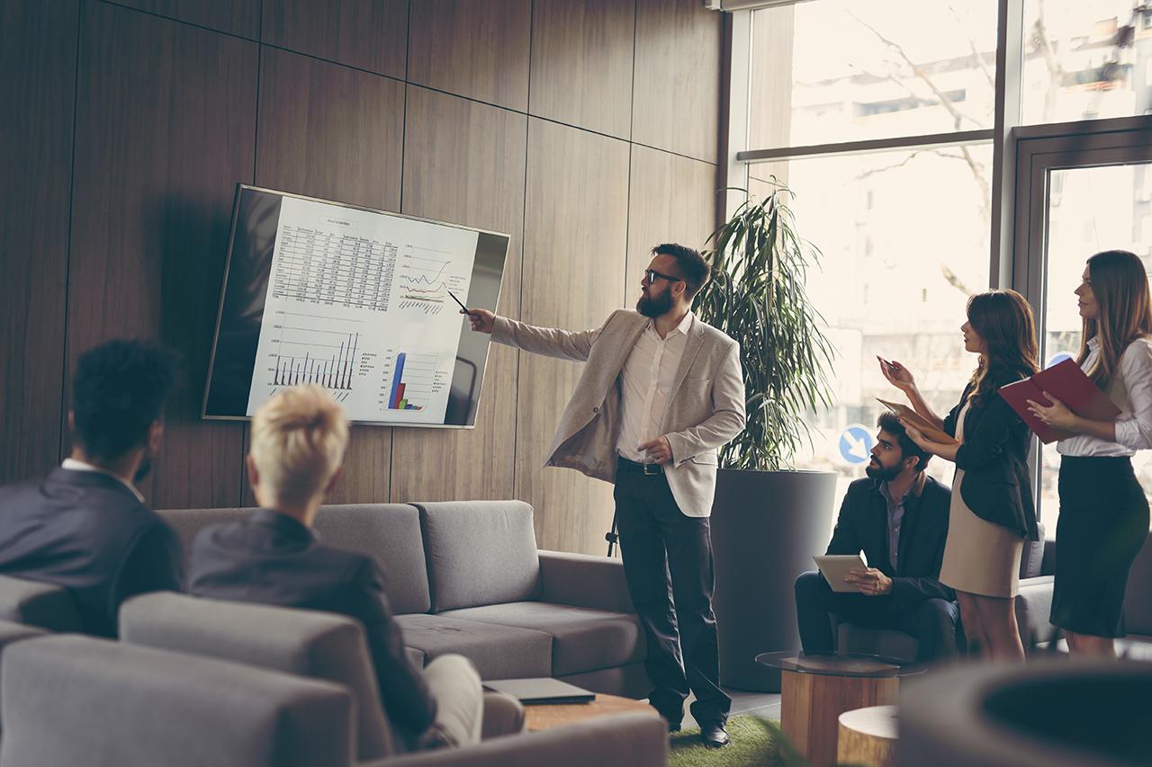 business meeting and presentation in a modern office