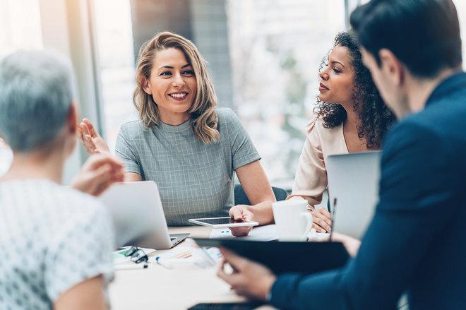 Group of people in a business meeting working to improve customer experience