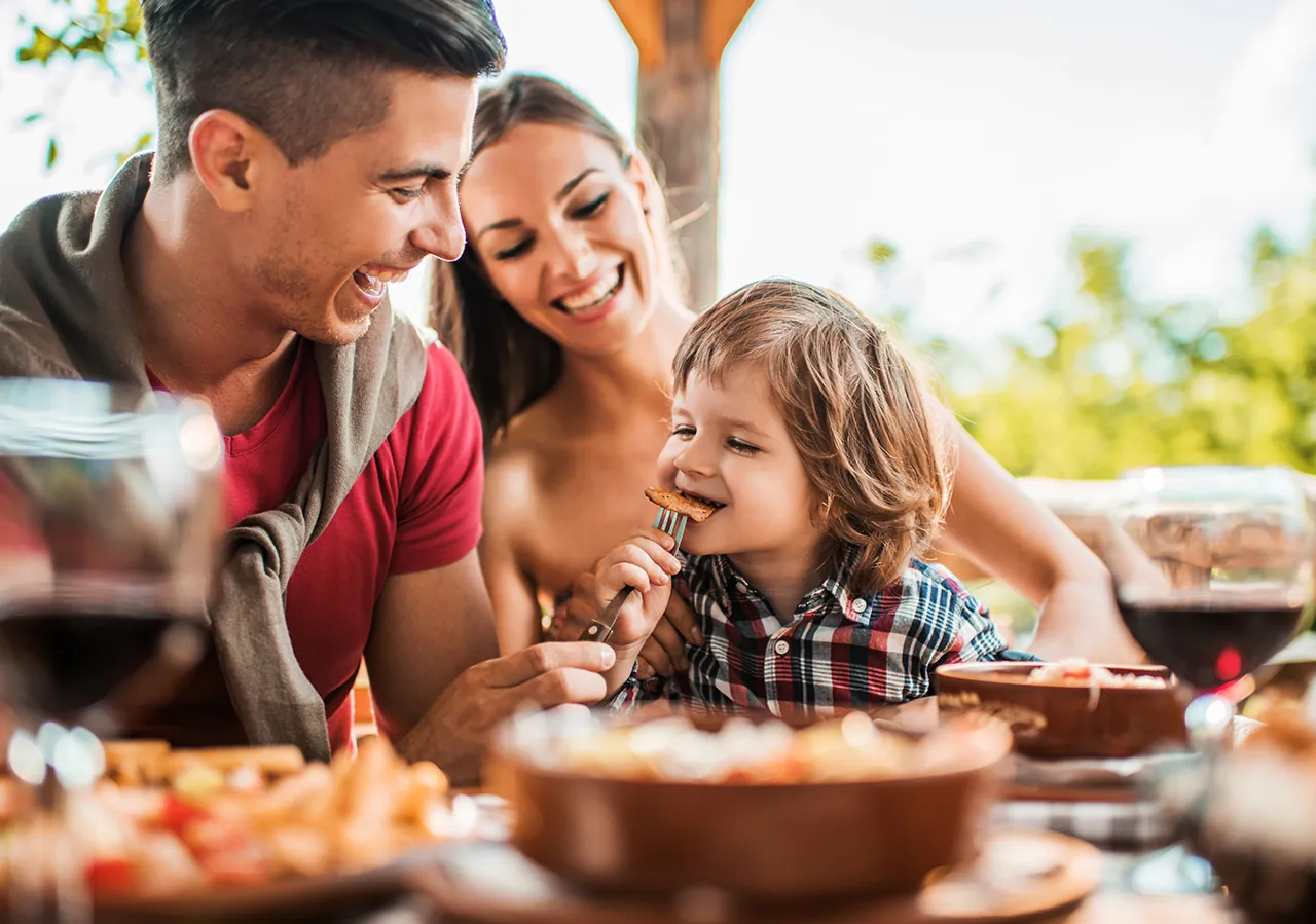 Pearl-Plaza + Jack in the Box partnership: image of a family at a table eating together